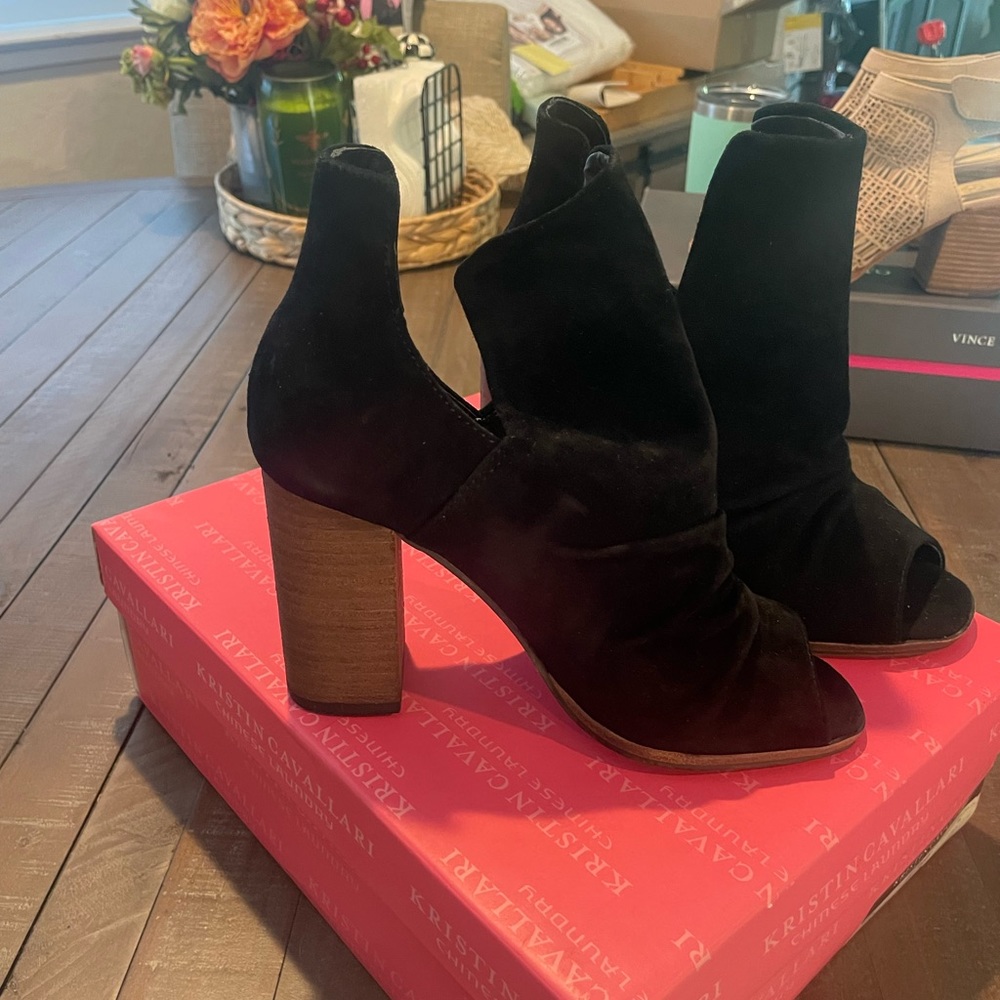 Kristin Cavallari Black suede peep toe cut out heels.